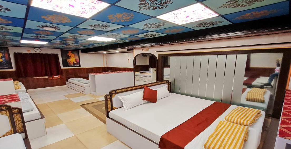 Cozy room setup in the Boys Dormitory at House of Sheherwali Hotel, Azimganj, blending modern comfort with heritage style