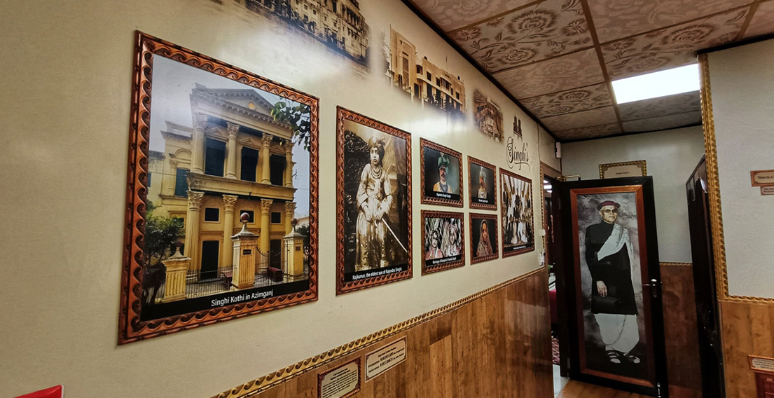 Intricate heritage wall art in Singhis Room at House of Sheherwali Hotel in Azimganj, celebrating the legacy of the Singhi family
