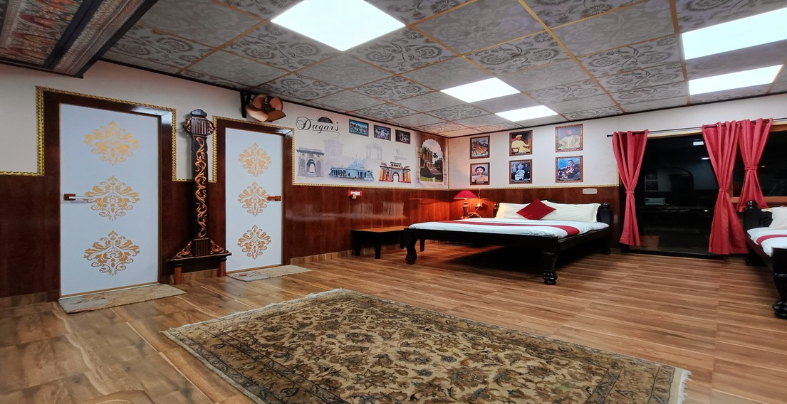 Intricate artwork on the walls of Dugars Room at House of Sheherwali Hotel in Azimganj