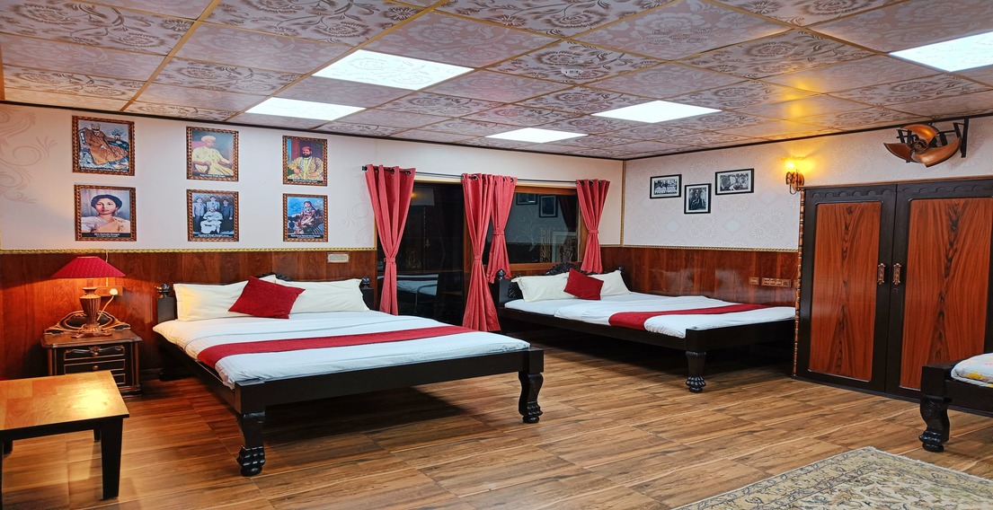 Bed view of Dugars Room at House of Sheherwali Hotel in Azimganj, showcasing comfort and heritage