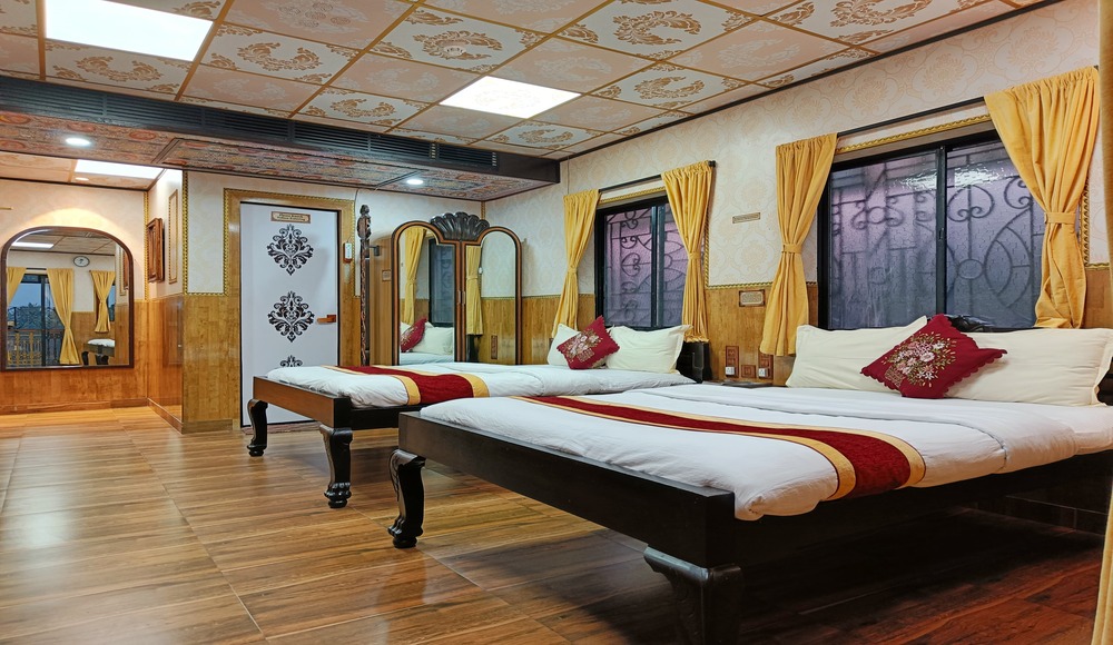 Luxurious bed in Nahars Room at House of Sheherwali, Azimganj, showcasing heritage decor and comfort