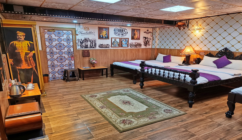 Luxurious bed setup in the Nowlakhas' Room at Hotel House of Sheherwali, Azimganj