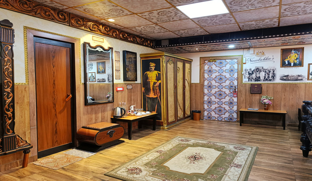 Traditional wall art adorning the Nowlakhas' Room at Hotel House of Sheherwali, Azimganj