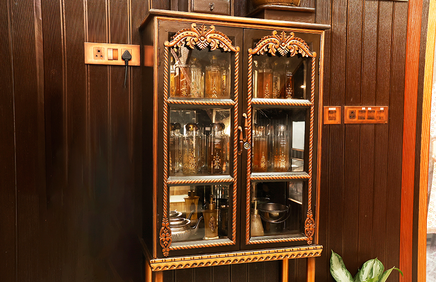 A collection of antique glassware displayed at House of Sheherwali, showcasing intricate craftsmanship and historical significance.