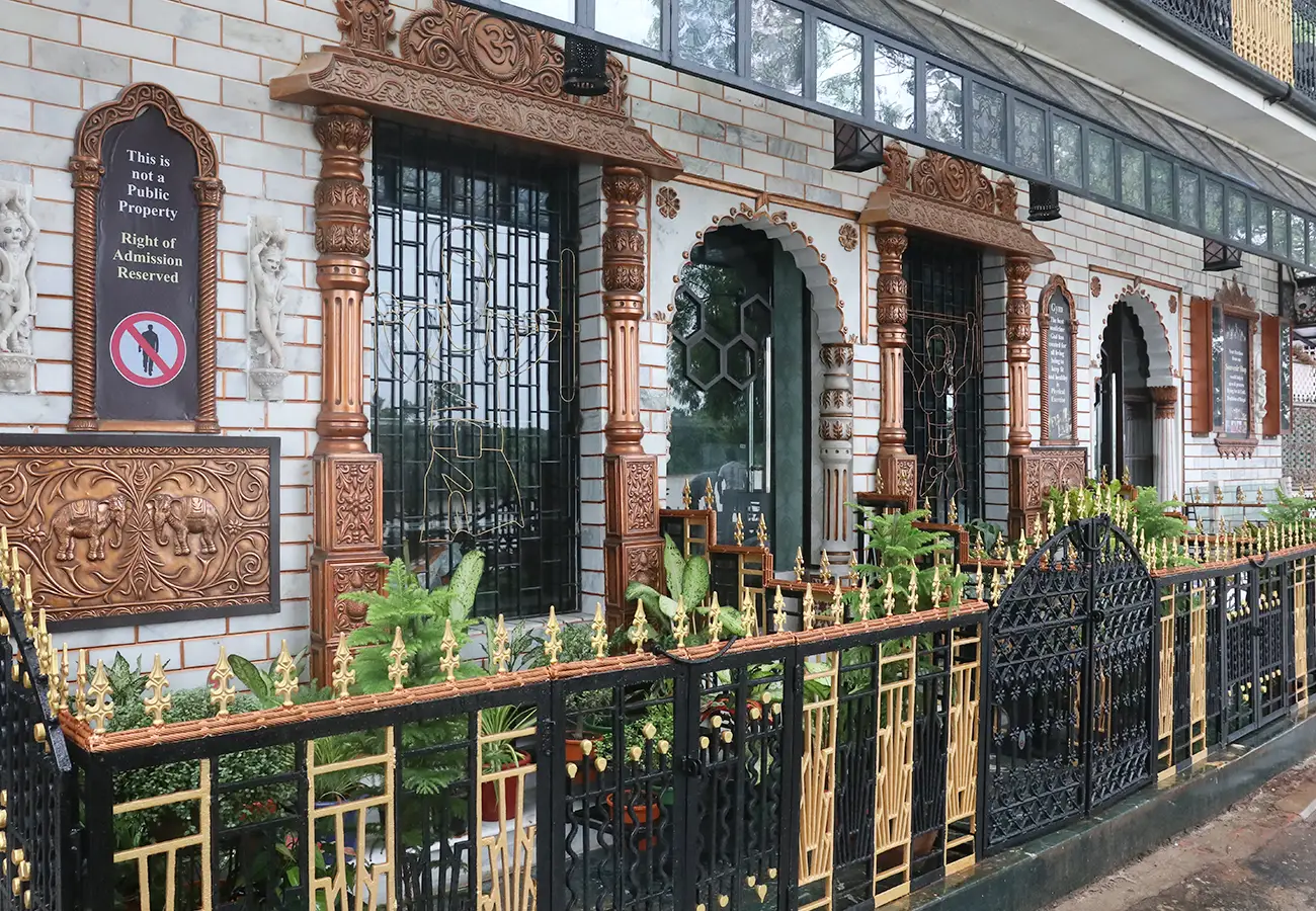 Exterior view of House of Sheherwali, a heritage hotel in Azimganj, showcasing its historic design and elegant architecture