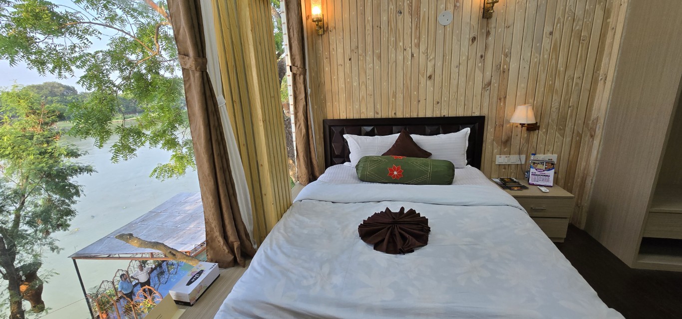 Luxury Suite bedroom overlooking River Bhagirathi at House of Sheherwali Murshidabad
