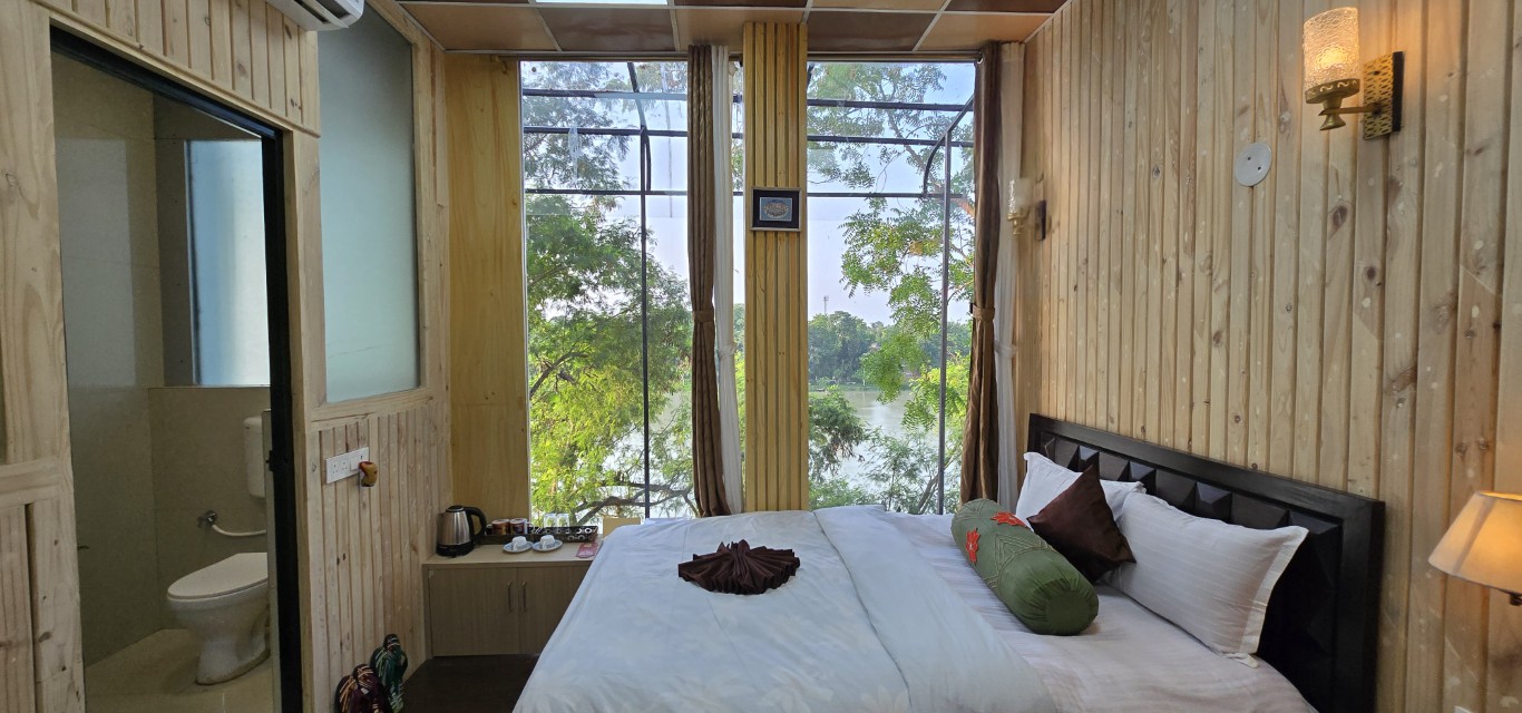Luxury Suite with floor to ceiling river view windows in Murshidabad