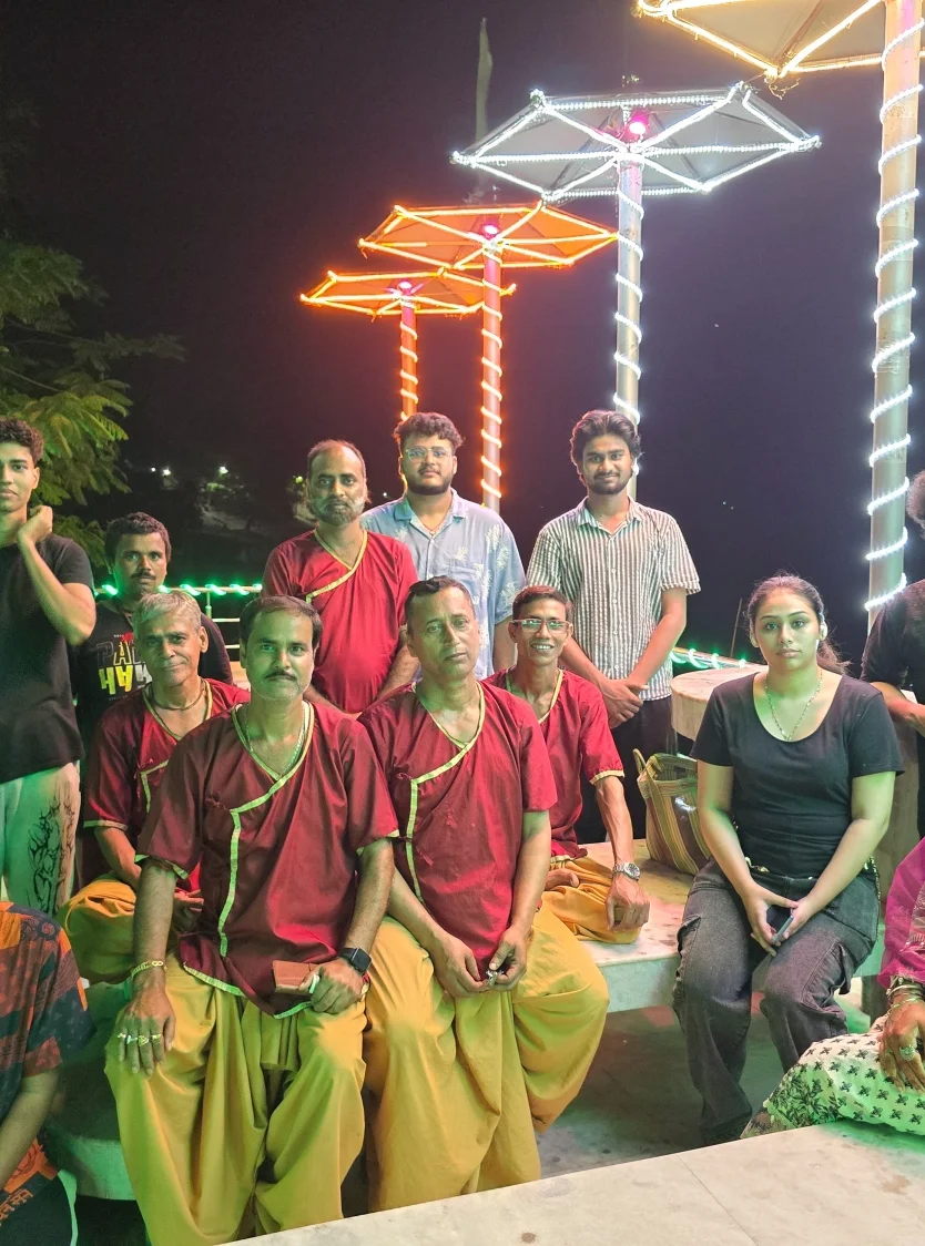 Students and folk performers in traditional attire during a Baul music evening at House of Sheherwali, Murshidabad